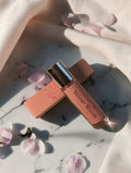 Velour Bloom mini perfume by LuxeScent Minis, floral feminine fragrance, cherry blossom petals, luxury travel perfume.